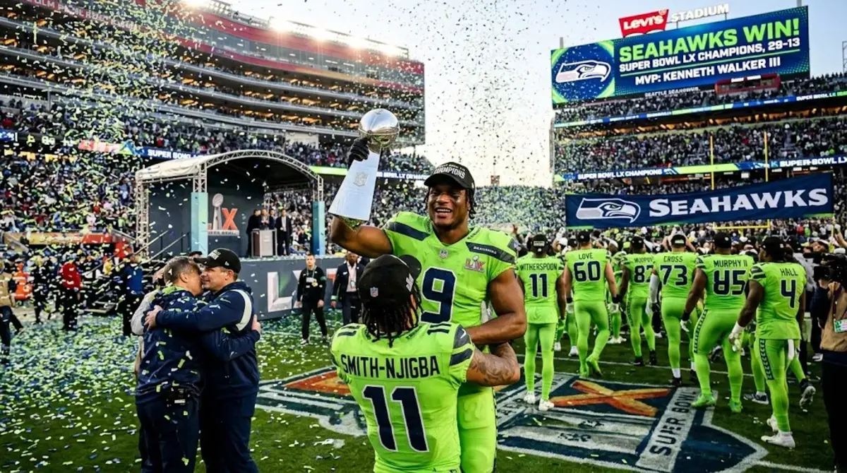 Seattle Seahawks celebrate NFL 2026 Super Bowl LX victory over New England Patriots 29-13 with Kenneth Walker III holding Lombardi Trophy
